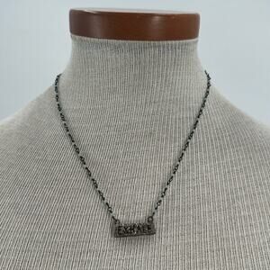 Handmade sterling silver exhale necklace
